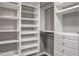 Well-organized walk-in closet with custom shelving, drawers, and ample storage for all wardrobes at 2769 Peachtree Ne Rd # 10, Atlanta, GA 30305