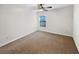 Bright bedroom with a ceiling fan and a window with blinds allowing natural light at 3305 Pleasant Manor Ct, Cumming, GA 30028