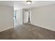 Spacious bedroom with carpet, natural light, and access to another room at 3305 Pleasant Manor Ct, Cumming, GA 30028