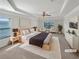 Bright bedroom with a ceiling fan, neutral walls, and ample natural light streaming through the window at 3305 Pleasant Manor Ct, Cumming, GA 30028