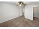 Bedroom with a ceiling fan and an open door that leads to the closet at 3305 Pleasant Manor Ct, Cumming, GA 30028