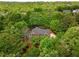 Secluded home nestled in lush green trees, offering privacy and tranquility on a sprawling lot at 3895 Overlake Dr, Cumming, GA 30041