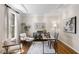 Bright home office with hardwood floors, neutral decor, and ample natural light at 3895 Overlake Dr, Cumming, GA 30041