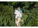 Aerial view of roof and pool in green landscape at 4 W Wesley Nw Rdg, Atlanta, GA 30327