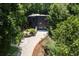 Aerial view of the home showing landscaping at 4 W Wesley Nw Rdg, Atlanta, GA 30327