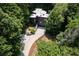 Aerial view of the home showing landscaping and roof at 4 W Wesley Nw Rdg, Atlanta, GA 30327