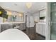 Bright bathroom features a double vanity, a walk-in shower, and a stand alone tub at 4 W Wesley Nw Rdg, Atlanta, GA 30327