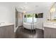Bright bathroom features double sinks, a walk-in shower, a stand alone tub, and modern fixtures at 4 W Wesley Nw Rdg, Atlanta, GA 30327