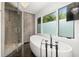 Luxurious bathroom features a stand alone tub, large shower, and stylish design at 4 W Wesley Nw Rdg, Atlanta, GA 30327