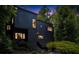 Beautiful modern home with sleek black exterior at dusk at 4 W Wesley Nw Rdg, Atlanta, GA 30327