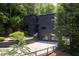 Modern home with lush greenery at 4 W Wesley Nw Rdg, Atlanta, GA 30327