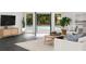 Inviting living room with an access to a swimming pool and comfortable seating for entertaining at 4 W Wesley Nw Rdg, Atlanta, GA 30327