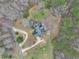 Overhead view of the estate, featuring a long driveway and a heavily wooded, secluded location at 905 Attaway Rd, Bowdon, GA 30108