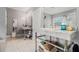 Elegant bathroom with marble floors and countertops, double sinks, and modern lighting at 905 Attaway Rd, Bowdon, GA 30108