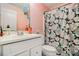 Bathroom featuring decorative floral shower curtain at 905 Attaway Rd, Bowdon, GA 30108
