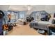 Large bedroom featuring a seating area, bed, and natural lighting at 905 Attaway Rd, Bowdon, GA 30108