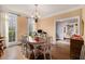 Bright dining room with large windows, creating an inviting space for meals at 905 Attaway Rd, Bowdon, GA 30108