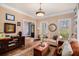 Comfortable living room with hardwood floors and natural light, perfect for relaxation at 905 Attaway Rd, Bowdon, GA 30108