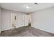 Spacious bedroom with neutral walls, carpet, and two large closets at 164 Adrian Dr, Stockbridge, GA 30281
