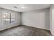 Bright bedroom with neutral walls, carpet, and a large window at 164 Adrian Dr, Stockbridge, GA 30281