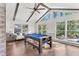Game room with vaulted ceiling, pool table, and plenty of windows offering natural light and great views at 2480 Roxburgh Dr, Roswell, GA 30076