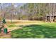Well-maintained soccer field with artificial turf and natural surroundings for recreational enjoyment at 2480 Roxburgh Dr, Roswell, GA 30076