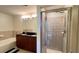 Bathroom with a bathtub, double vanity, and tiled shower at 390 17Th Nw St # 4037, Atlanta, GA 30363