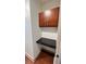 Granite countertop in laundry area with built-in cabinets for storage at 390 17Th Nw St # 4037, Atlanta, GA 30363