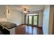 Bright living room with hardwood floors and patio access at 390 17Th Nw St # 4037, Atlanta, GA 30363