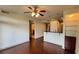 Open-concept living space showcasing hardwood floors and kitchen access at 390 17Th Nw St # 4037, Atlanta, GA 30363