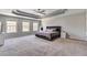 Spacious main bedroom boasts abundant natural light and a large walk in closet at 5 Burns View Ct, Lawrenceville, GA 30044