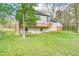 Spacious backyard showcasing the multi-level deck and the house's full exterior at 906 John Ct, Lawrenceville, GA 30046