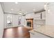 Cozy living room with fireplace, built-in shelves and windows at 906 John Ct, Lawrenceville, GA 30046