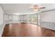 Bright living room with hardwood floors, large windows and view to the yard at 906 John Ct, Lawrenceville, GA 30046