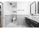 Modern bathroom with double sinks, a sleek black vanity, and contemporary fixtures at 1970 Capri Dr, Decatur, GA 30032