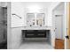Contemporary bathroom featuring double sinks, stylish mirrors, and modern fixtures at 1970 Capri Dr, Decatur, GA 30032