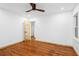 Open bedroom with hardwood floors, neutral walls, and natural lighting at 1970 Capri Dr, Decatur, GA 30032