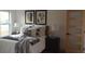Stylishly decorated bedroom with a comfortable bed, modern art, and plenty of natural light at 1970 Capri Dr, Decatur, GA 30032