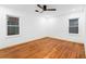 Open bedroom with hardwood floors, neutral walls, and natural lighting at 1970 Capri Dr, Decatur, GA 30032
