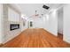 Inviting living room boasts a stylish fireplace, hardwood floors, and abundant natural light at 1970 Capri Dr, Decatur, GA 30032