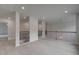 Spacious loft area with natural light and stylish railing at 205 Haverling Pass, Hampton, GA 30228