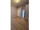 Spacious bedroom with hardwood floors, neutral paint, and closet at 91 Brookway Trce, Norcross, GA 30071