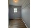 A small closet with light wood floors and wire shelving at 91 Brookway Trce, Norcross, GA 30071