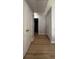 Hallway with hardwood floors and access to the second floor at 91 Brookway Trce, Norcross, GA 30071