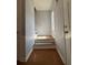 Entryway featuring stairway with temporary flooring protection and a window at 91 Brookway Trce, Norcross, GA 30071