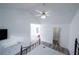 Spacious bedroom offers natural light with ensuite bathroom and wood-look flooring at 1488 Cottage Way #32, Marietta, GA 30066
