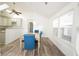 Cozy dining area featuring a stylish table set, abundant natural light, and modern finishes at 1488 Cottage Way #32, Marietta, GA 30066