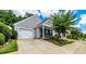 Charming home with a one-car garage, a front porch, and a well-maintained lawn at 1488 Cottage Way #32, Marietta, GA 30066