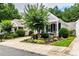 Charming home with a landscaped front yard, inviting porch, and curb appeal at 1488 Cottage Way #32, Marietta, GA 30066