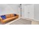 Neutral bedroom featuring a couch, carpet and double door closet at 5143 Micaela Way, Duluth, GA 30096